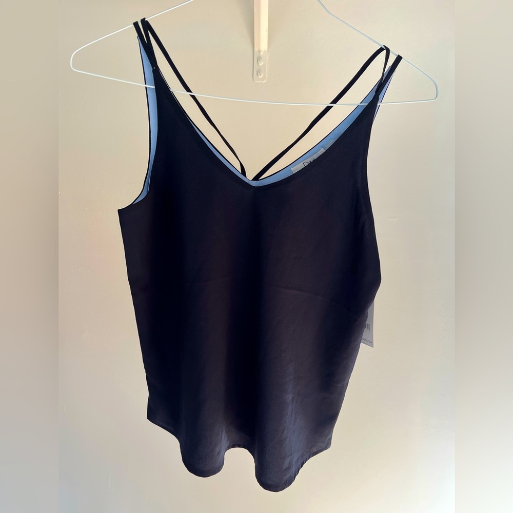 Blue sleeveless blouse with strap detail